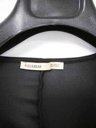 Vestido negro terciopelo corte irregular