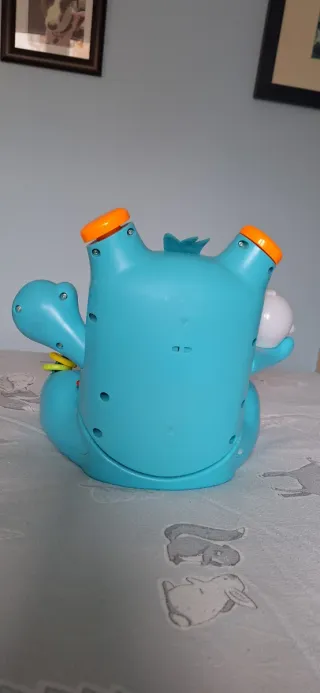 Juguete musical interactivo Rocky Roquero