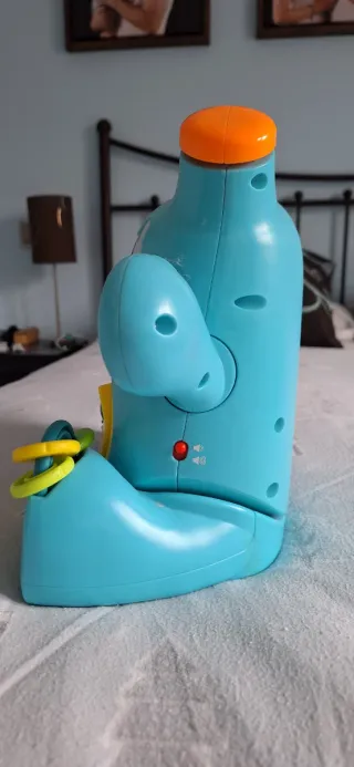 Juguete musical interactivo Rocky Roquero