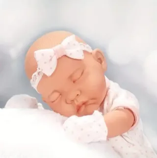 Bebé con manta rosa