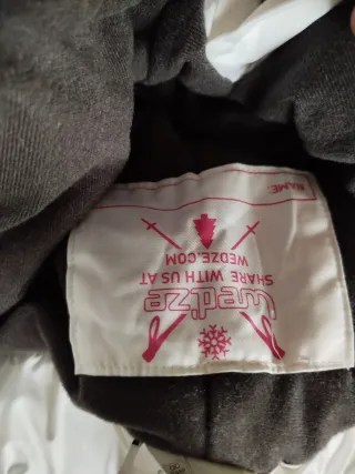 Pantalón de esquí blanco con cremalleras rosas