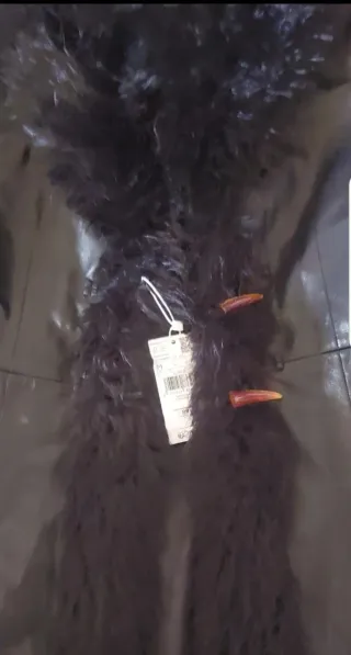 Abrigo efecto piel con pelo