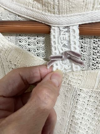 Top crop calado crema mangas murciélago