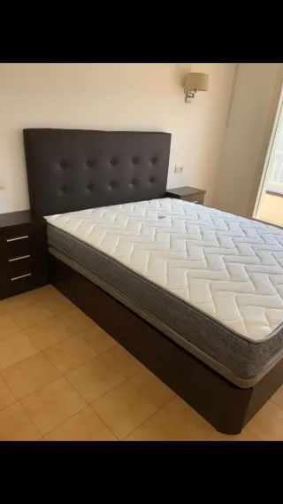 Canapé de tela con cabecero