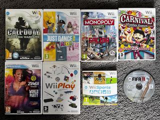 Consola Wii con Caja, accesorios 8 Juegos y más.