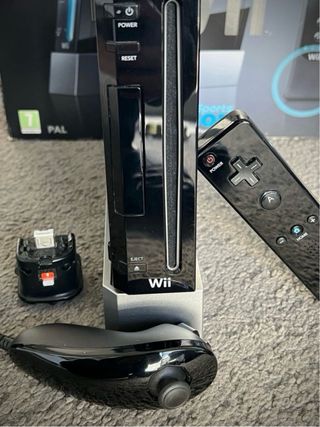 Consola Wii con Caja, accesorios 8 Juegos y más.