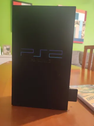 PS2 con 2 mandos y 6 juegos