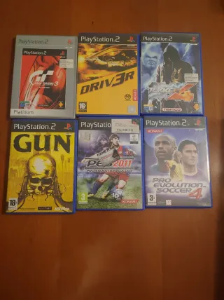 PS2 con 2 mandos y 6 juegos