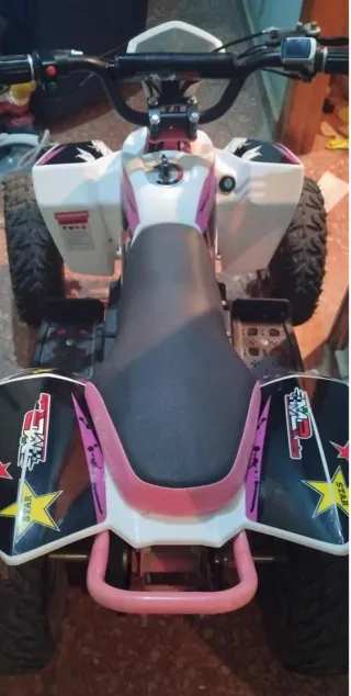 Quad infantil rosa y blanco