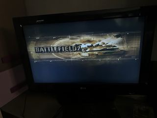 Consolle PlayStation 2 con giochi e accessori