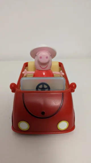 Cochecito rojo con Peppa Pig. Como nuevo.