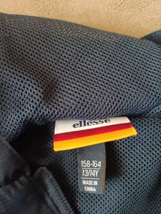 Cortavientos ellesse azul  blanco impermeable niño