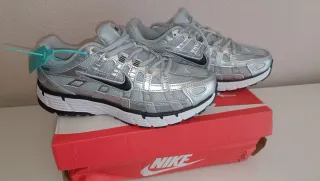 Zapatillas Nike Plata y Blanco