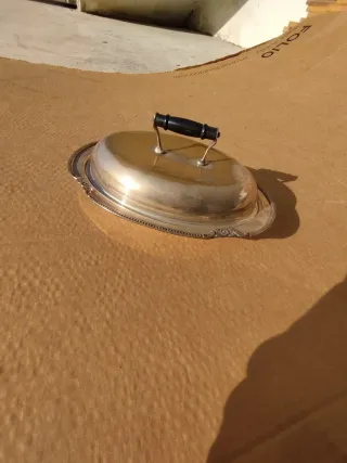 Vassoio in argento con manico