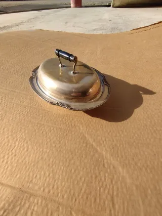 Vassoio in argento con manico