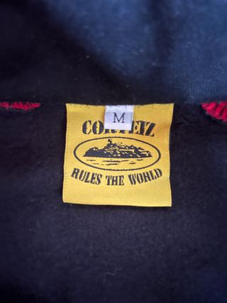 Chaqueta Corteiz Negra y Roja Talla M