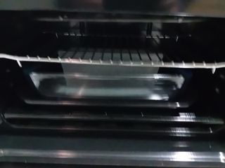 la cocina más pequeña horno y estufa