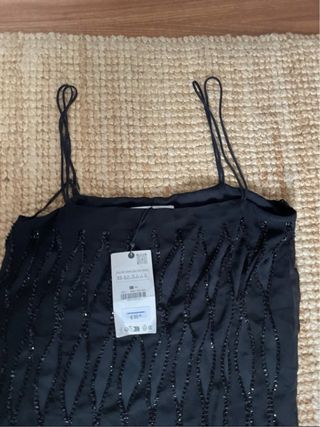 Vestido midi negro con flecos