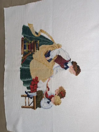 Tapete bordado a  de punto de cruz hecho a mano