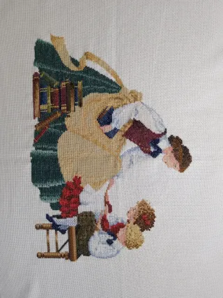 Tapete bordado a  de punto de cruz hecho a mano