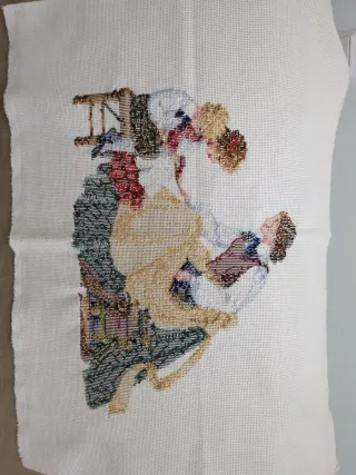 Tapete bordado a  de punto de cruz hecho a mano