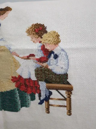 Tapete bordado a  de punto de cruz hecho a mano