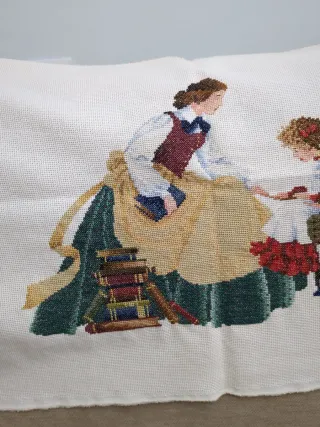 Tapete bordado a  de punto de cruz hecho a mano