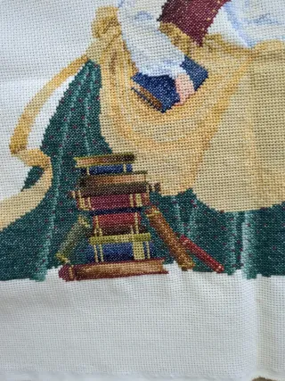 Tapete bordado a  de punto de cruz hecho a mano