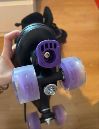 Patines 4 ruedas negros y morados