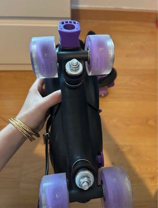 Patines 4 ruedas negros y morados