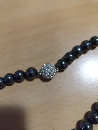 Collana perle nere con ciondolo strass