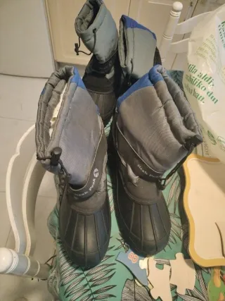 Botas de nieve Neak Peak negras y azules