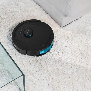 Robot aspirador láser con base de autovaciado