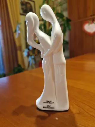 Coppia sposi porcellana bianca con fiore