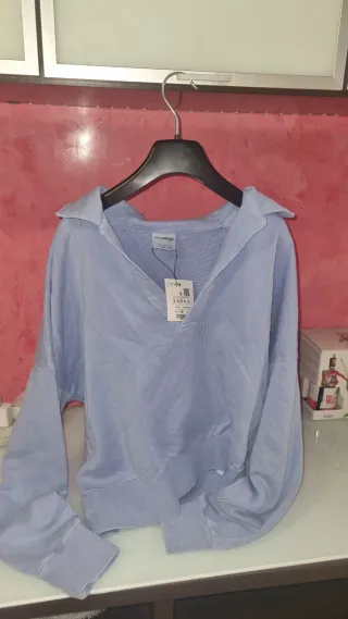 Jersey polo Pull&Bear cuello V azul claro