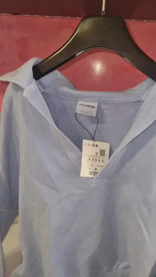 Jersey polo Pull&Bear cuello V azul claro