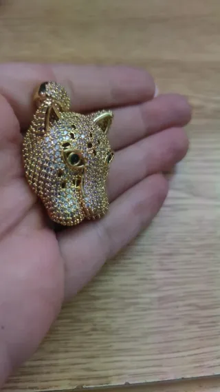 Colgante cabeza de leopardo con circonitas