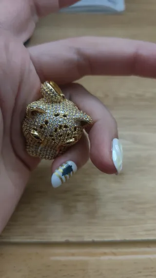 Colgante cabeza de leopardo con circonitas