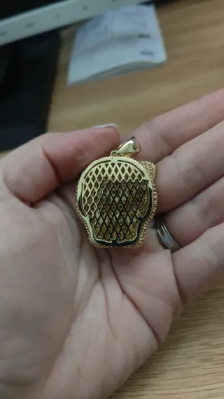 Colgante cabeza de leopardo con circonitas