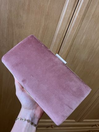 Bolso de mano rosa de terciopelo