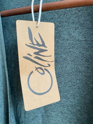 Chaqueta cárdigan verde asimétrica