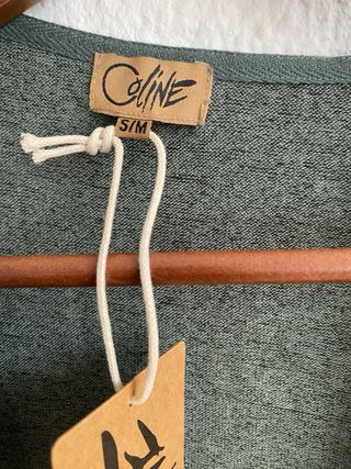 Chaqueta cárdigan verde asimétrica