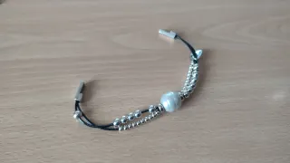 Pulsera negra bolas Zamak y perla
