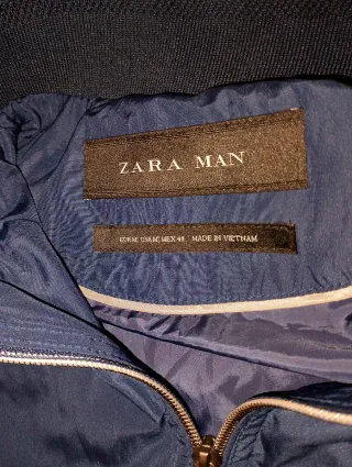 Cortavientos vintage azul y negro