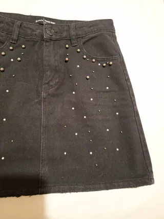 Falda mini negra tachuelas T.34