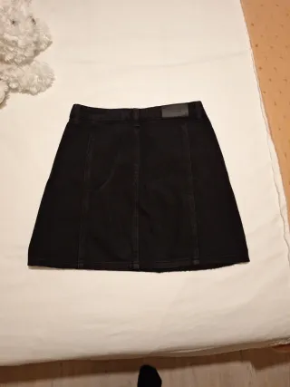 Falda mini negra tachuelas T.34