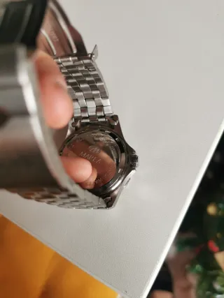 Reloj Marea Negro y Plateado