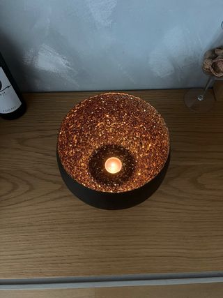 Portacandele nero con dettagli oro