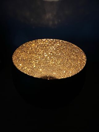 Portacandele nero con dettagli oro