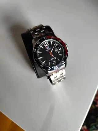 Reloj Marea Negro y Plateado